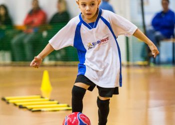 kids playing in soccer class